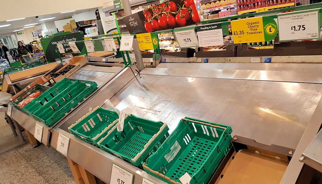 Empty fruit and veg shelves in a supermarket